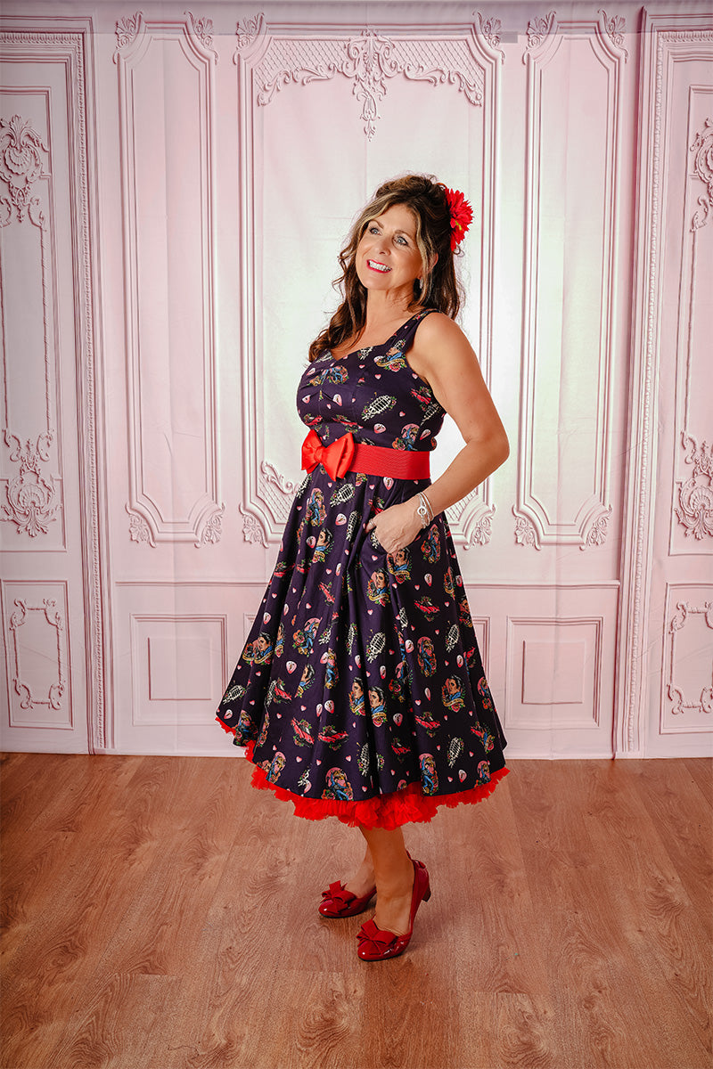 All Shook Up Elvis Print Dress on Model with Hands in Pockets