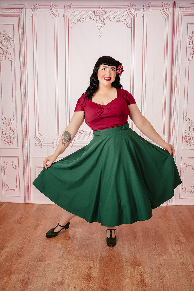 Forest Green Carmen Circle Skirt on Model from Front with both hands spreading skirt