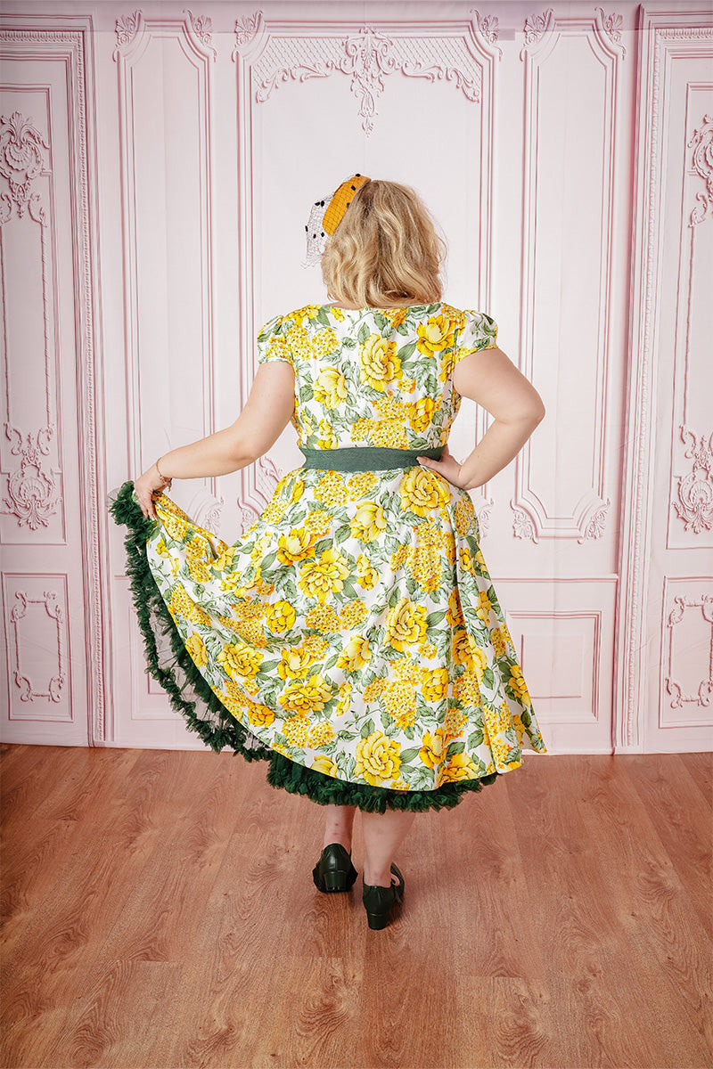 Dawny Swing Dress on Model paired with Yellow Fascinator from Rear