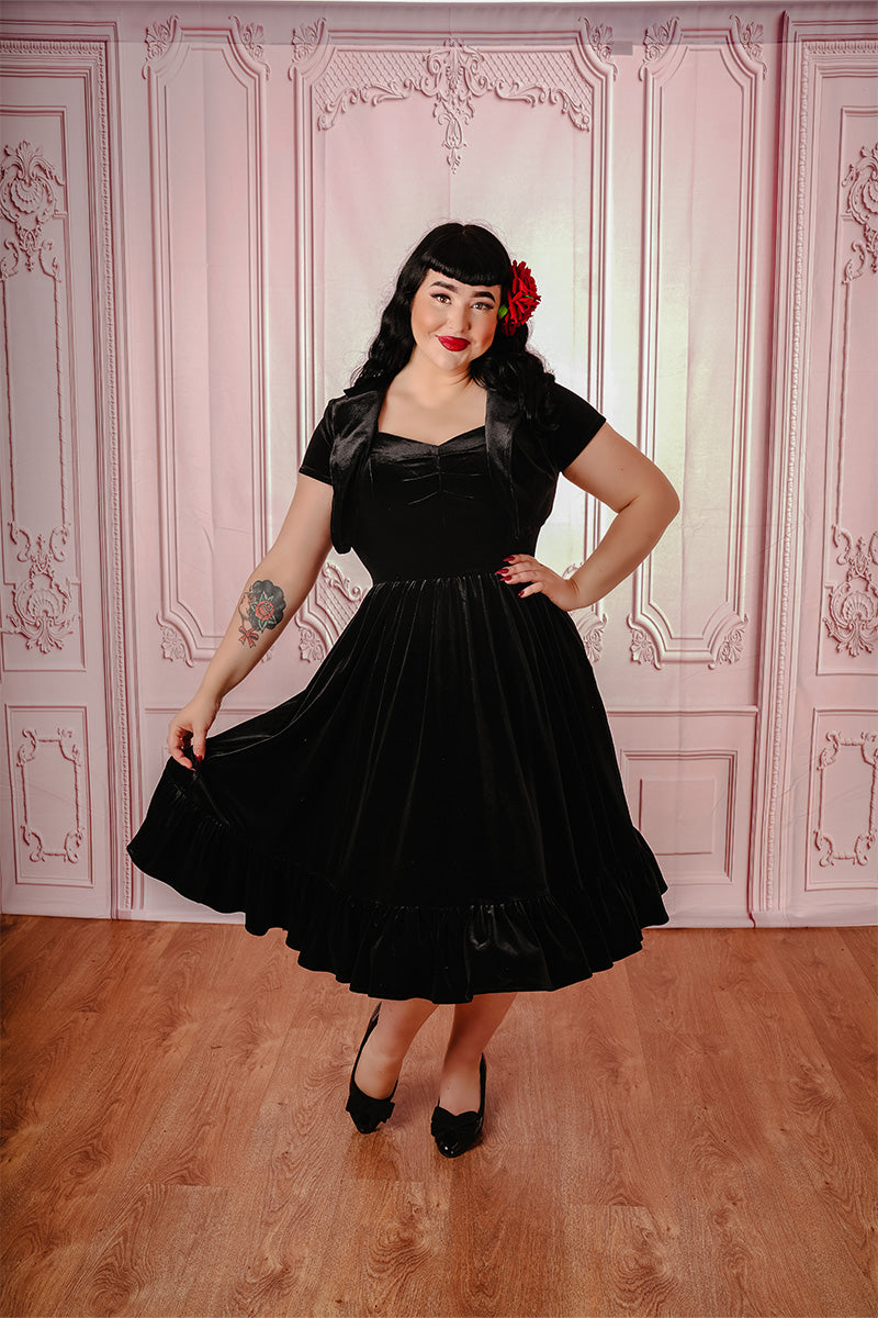 Black Vivienne Velvet Bolero on Model Paired with Black Dress