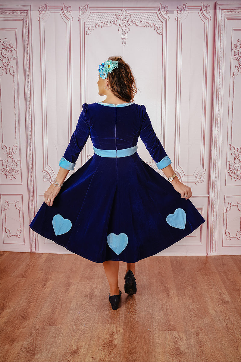 Alice Swing Dress on model with rear heart appliqué on show