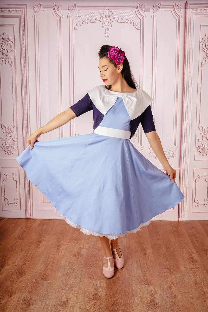 Belle Swing Dress in Blue on Model Front Paired with Navy Bolero